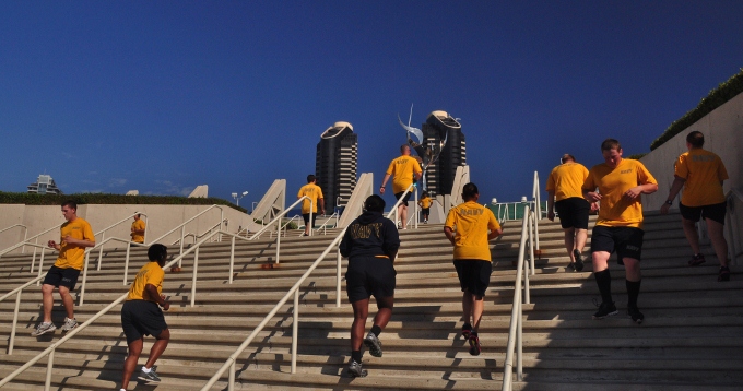 Navy recruits take part of the PT on the steps of the Convention Center 